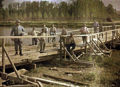 French Soldiers from a Special Unit Building a Wooden Bridge Across the Aisne, Soissons, France, 1917 by Fernand Cuville